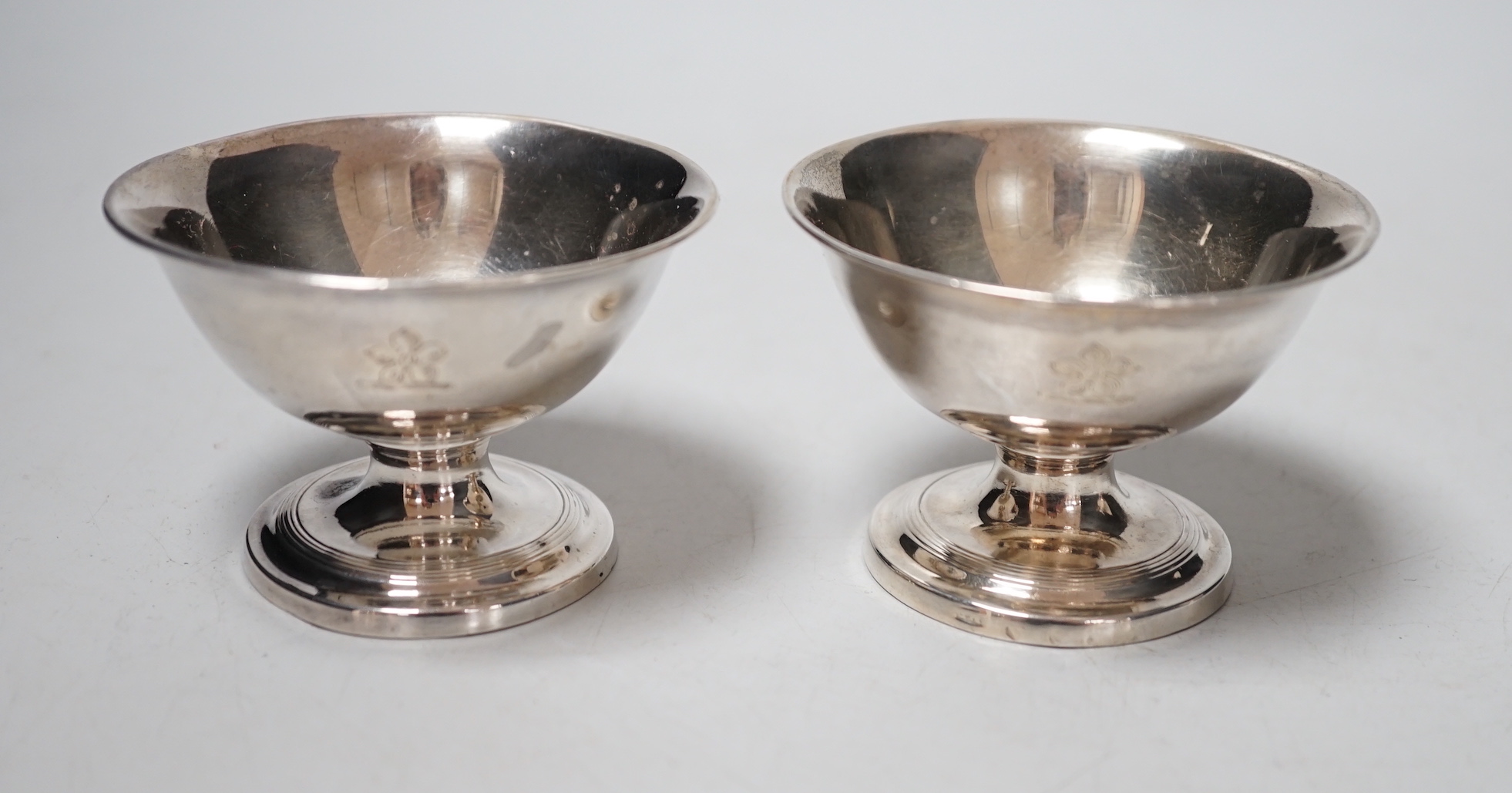 A pair of Matthew Boulton silver pedestal salt cellars, marks rubbed, height 5cm.